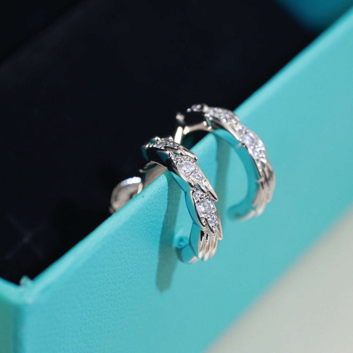Martin Graham stud earrings in polished metal-tone – main product view