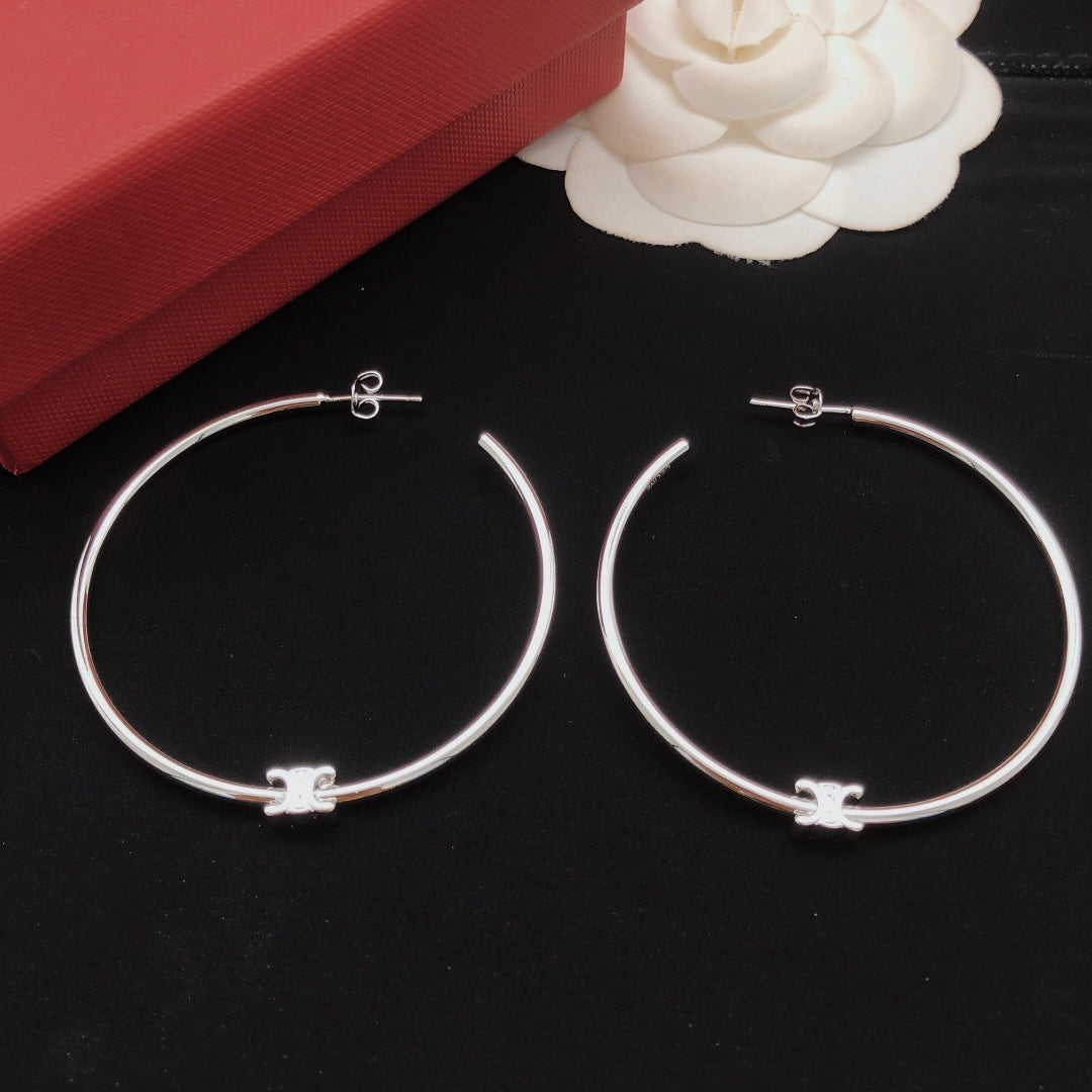Martin Graham earrings in polished metal-tone – main product view
