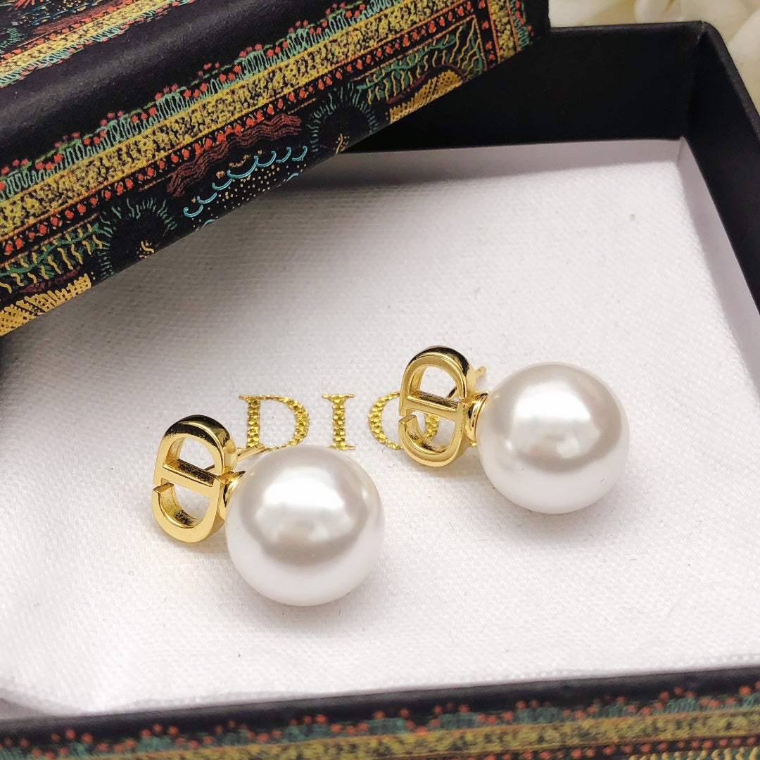 Martin Graham stud earrings in polished metal-tone – main product view