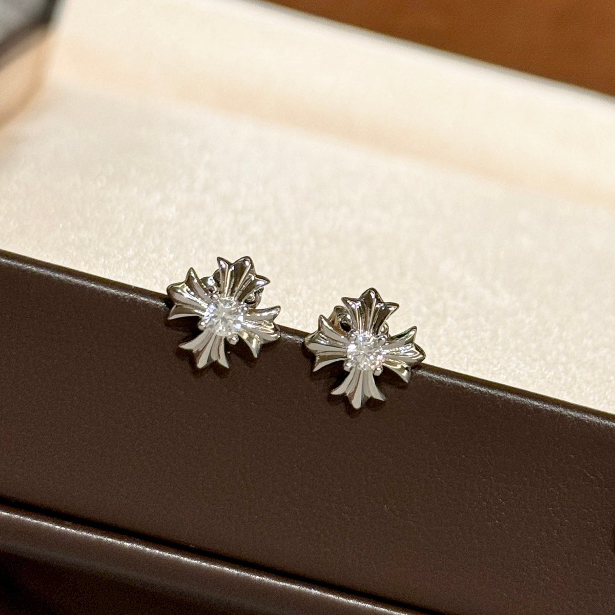 Martin Graham stud earrings in polished metal-tone – main product view