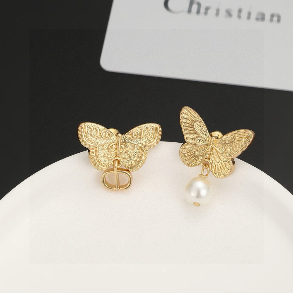 Martin Graham stud earrings in polished metal-tone – main product view