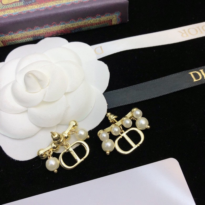 Martin Graham stud earrings in polished metal-tone – main product view