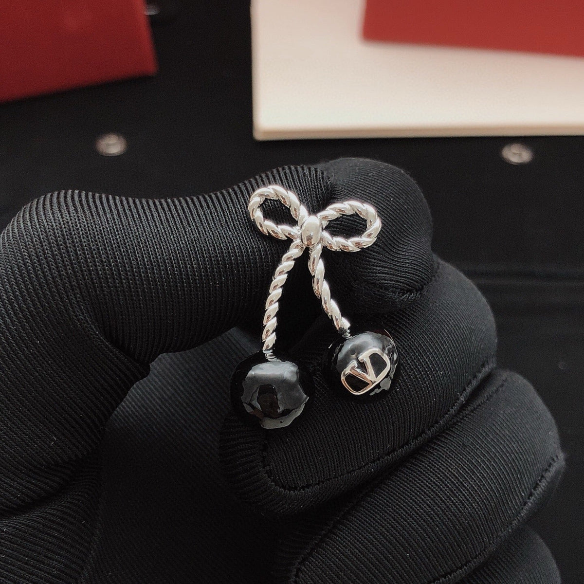 Martin Graham stud earrings in polished metal-tone – main product view