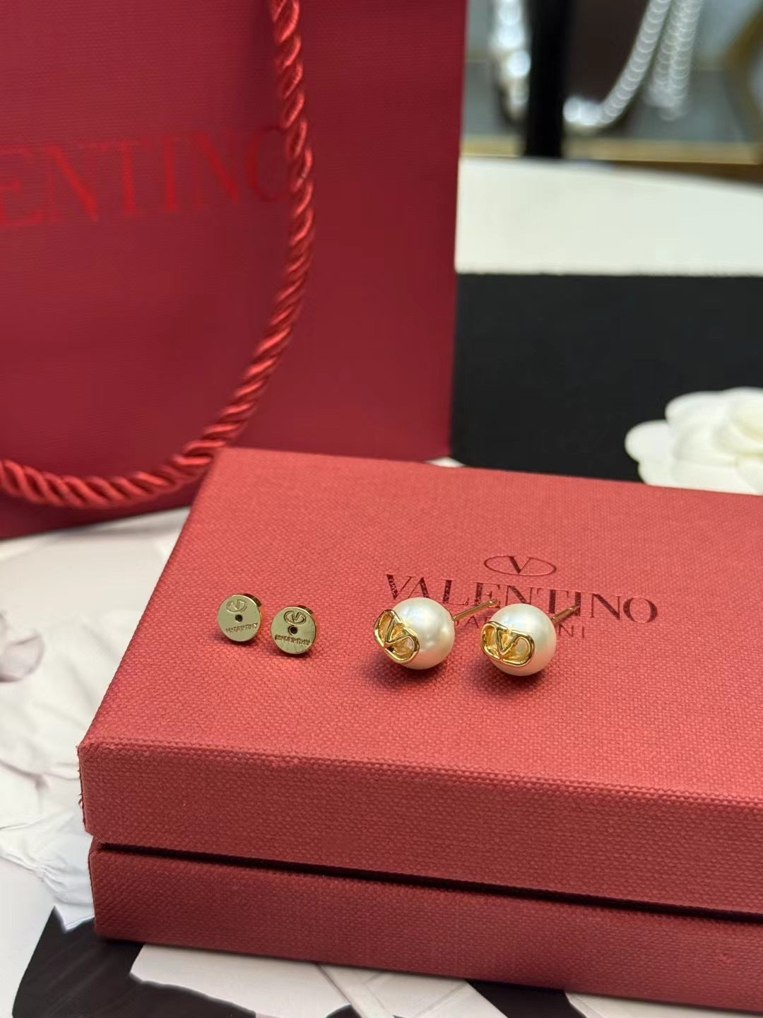 Martin Graham stud earrings in polished metal-tone – main product view