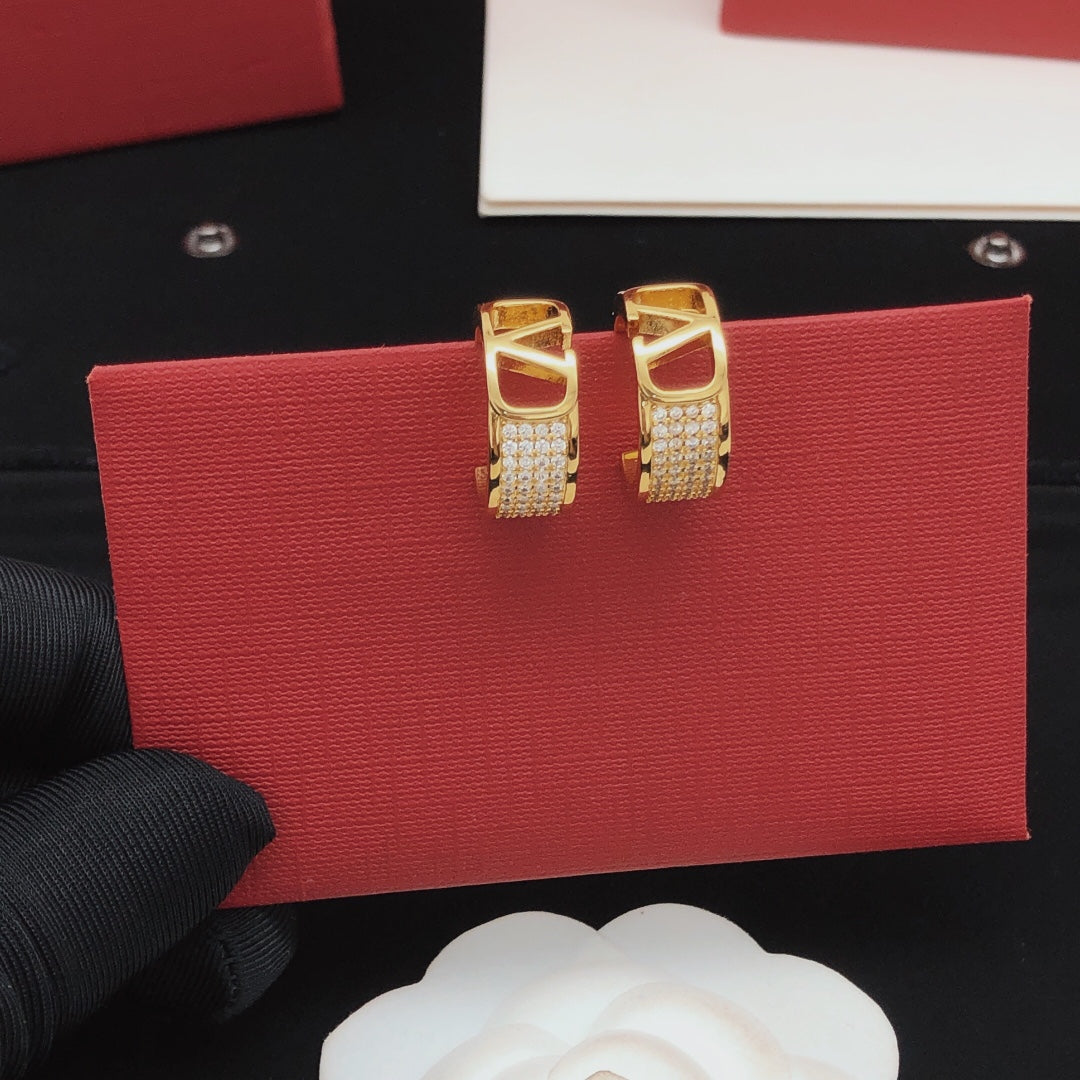 Martin Graham drop earrings in polished metal-tone – main product view