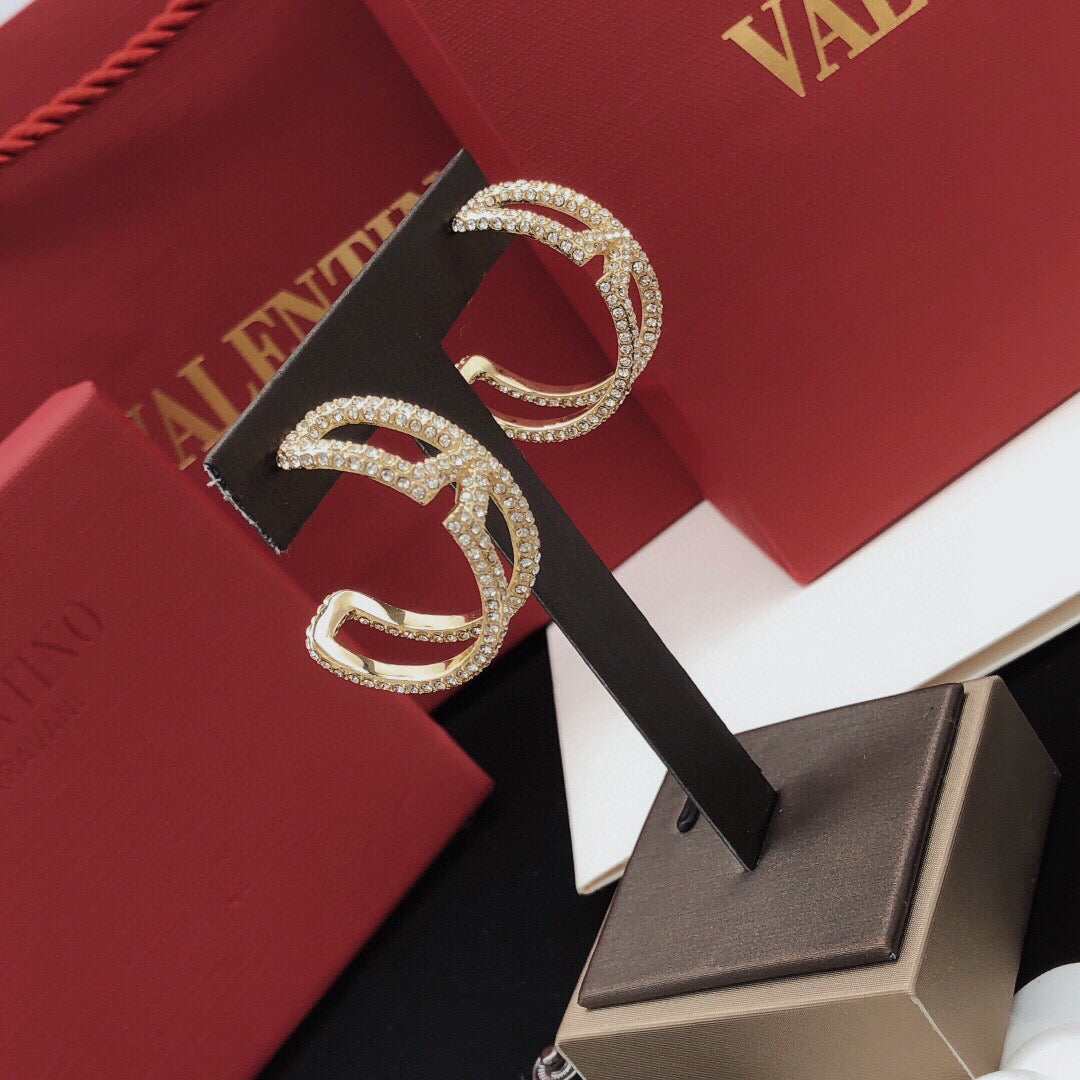 Martin Graham earrings in polished metal-tone – main product view
