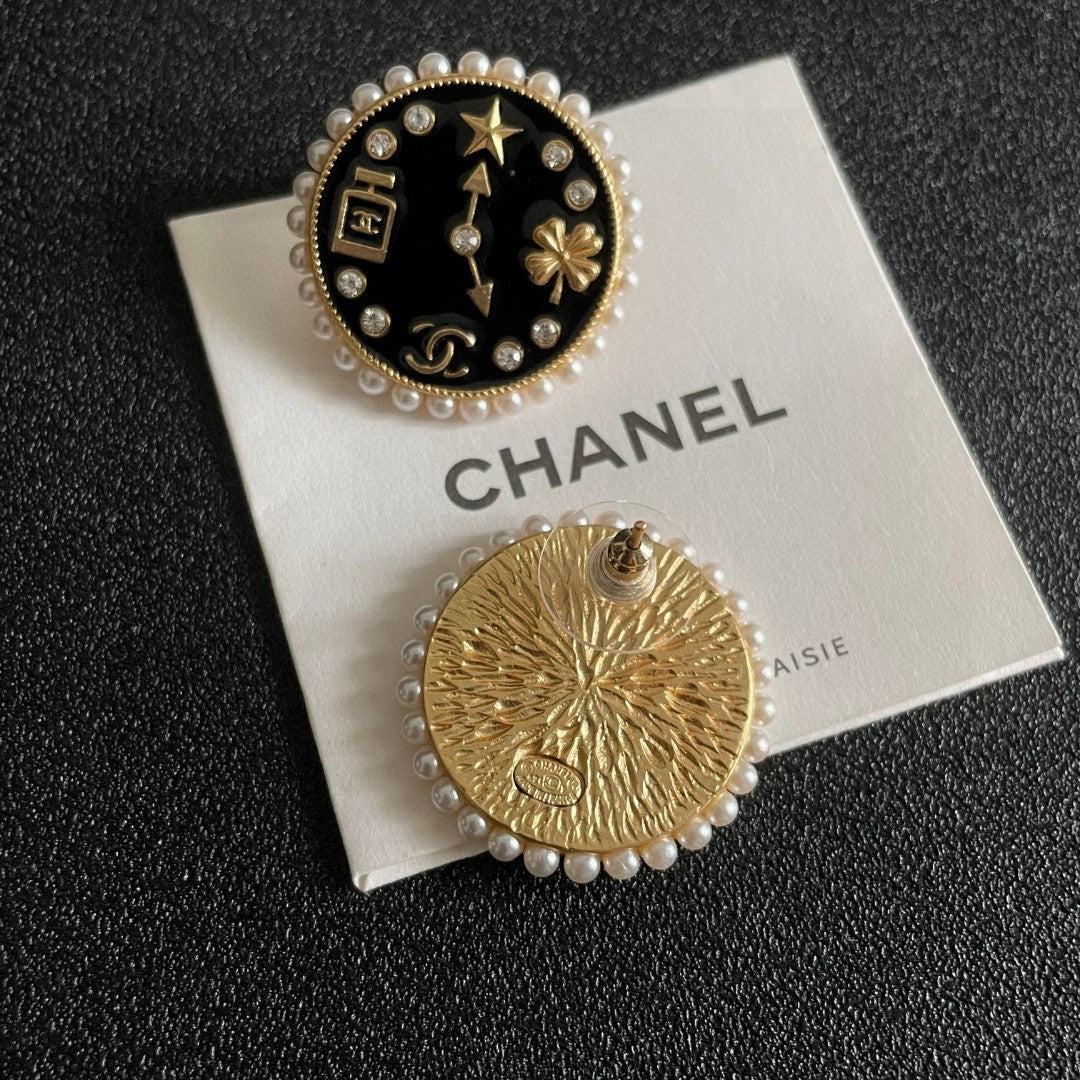 Martin Graham stud earrings in polished metal-tone – main product view