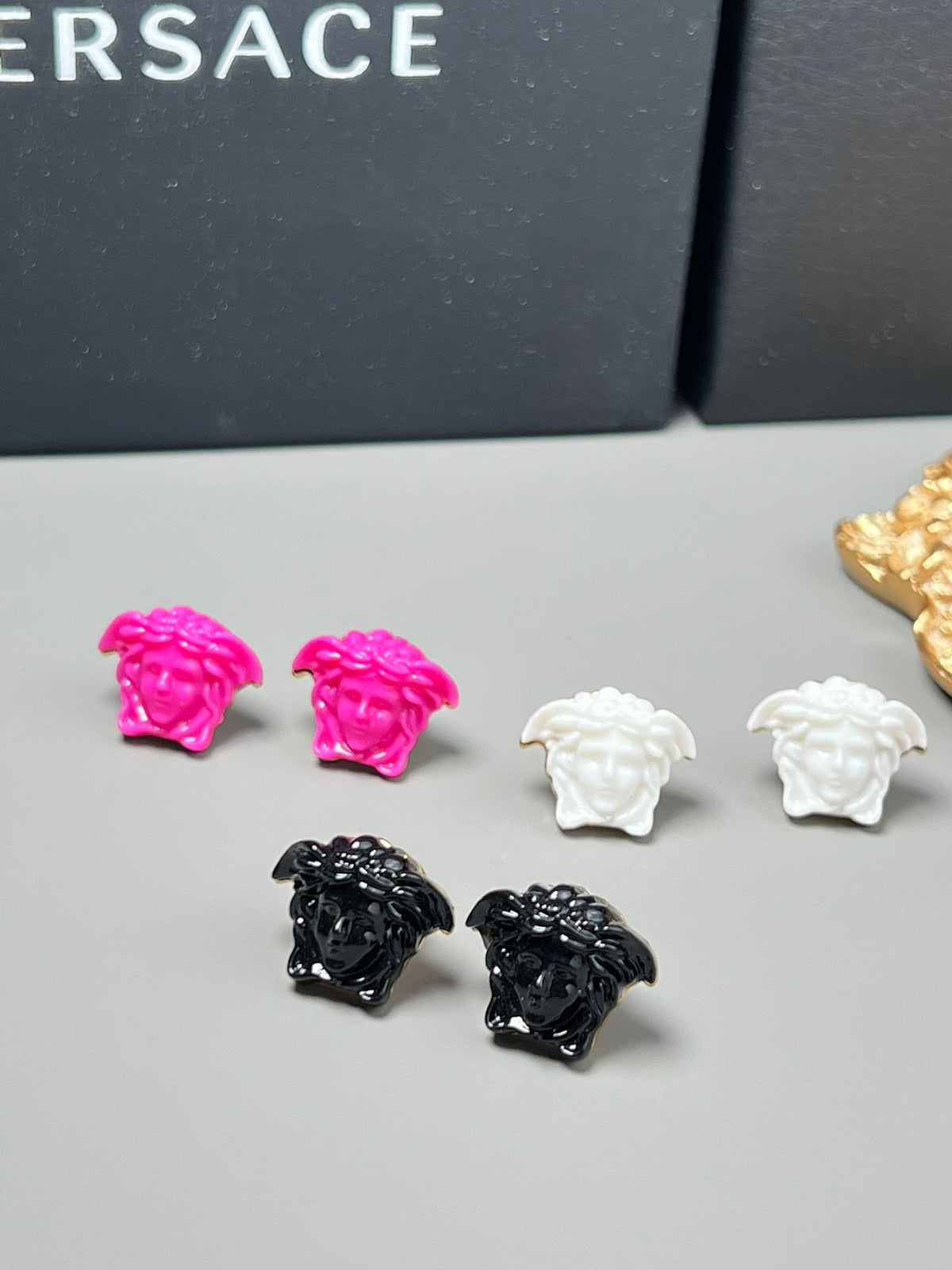 Martin Graham stud earrings in polished metal-tone – main product view