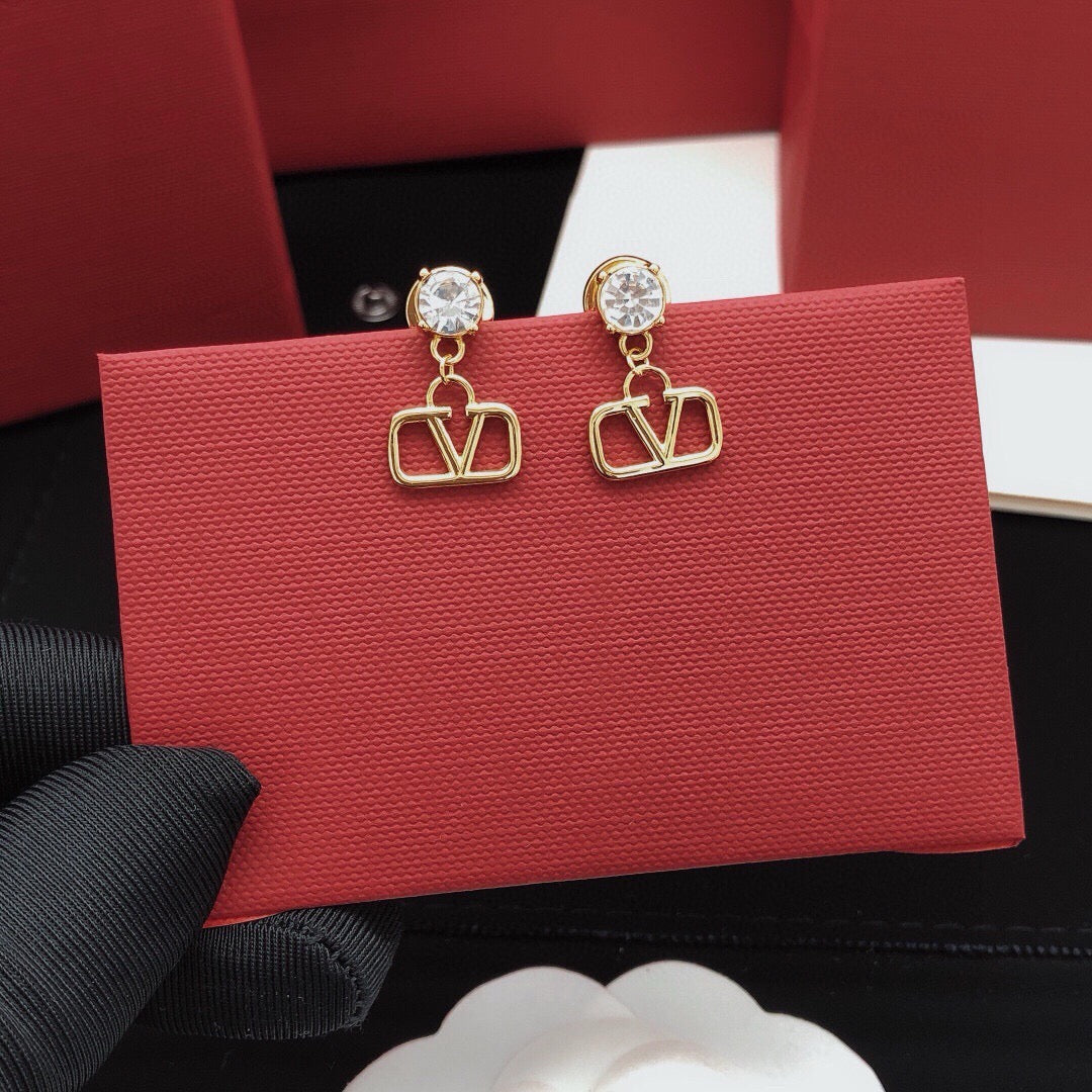 Martin Graham stud earrings in polished metal-tone – main product view