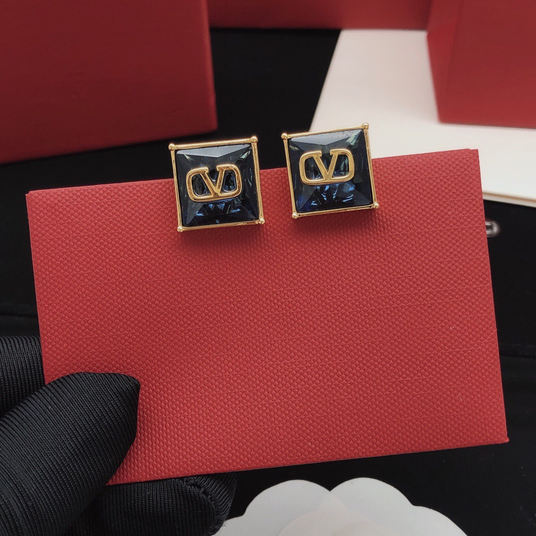 Martin Graham stud earrings in polished metal-tone – main product view