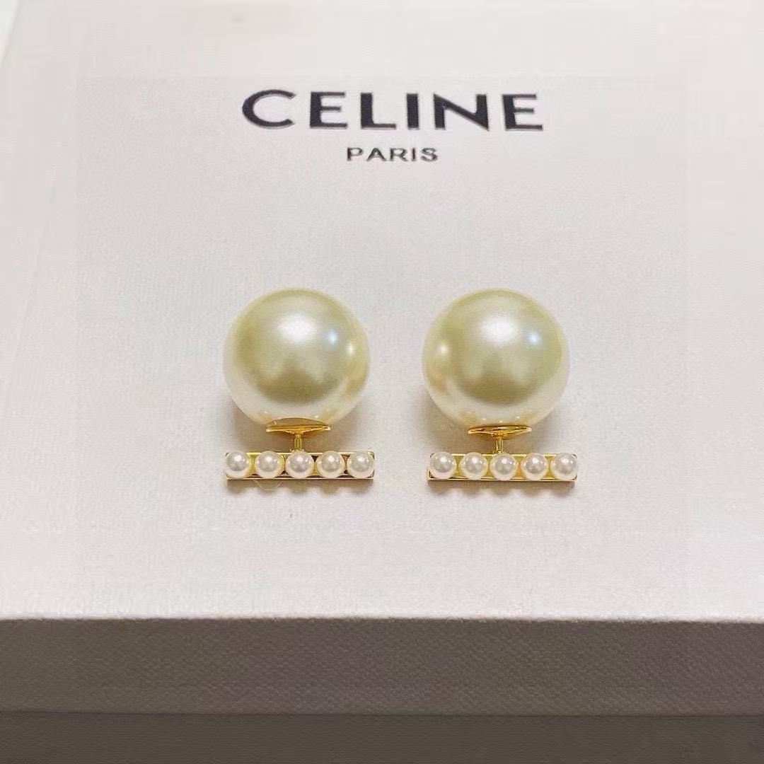 Martin Graham stud earrings in polished metal-tone – main product view