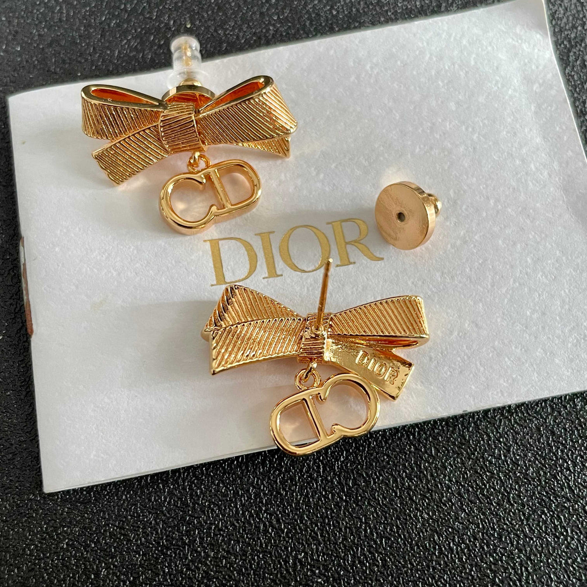 Martin Graham stud earrings in polished metal-tone – main product view