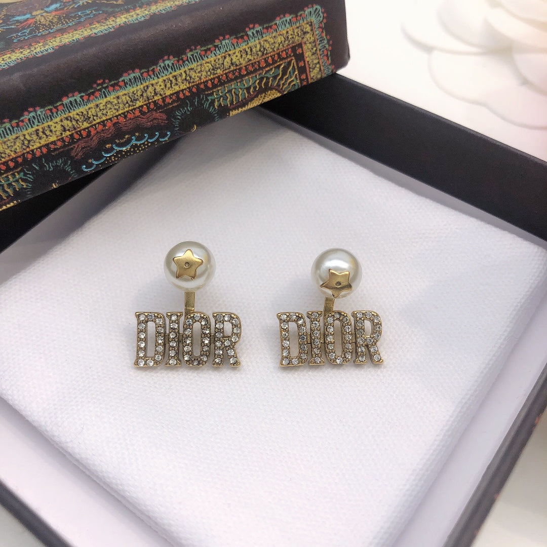 Martin Graham stud earrings in polished metal-tone – main product view