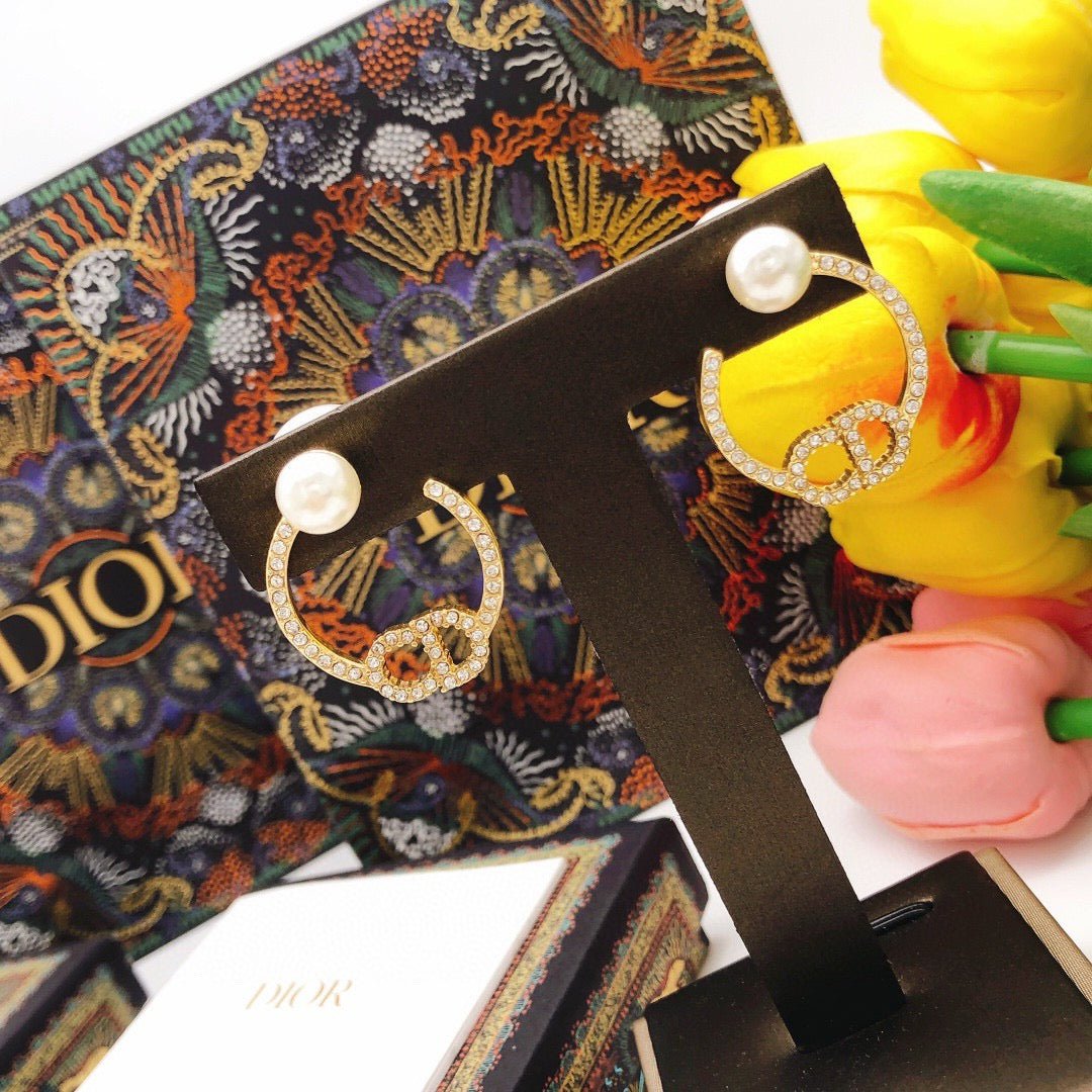 Martin Graham stud earrings in polished metal-tone – main product view