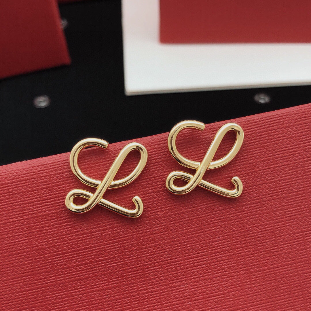Martin Graham stud earrings in polished metal-tone – main product view