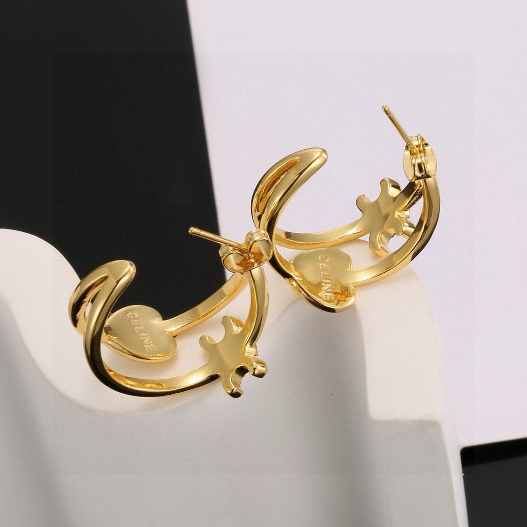 Martin Graham stud earrings in polished metal-tone – main product view