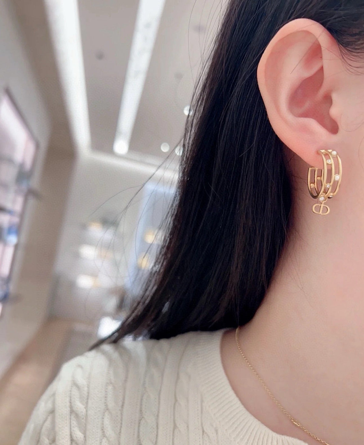 Martin Graham stud earrings in polished metal-tone – main product view
