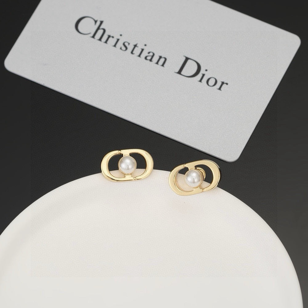 Martin Graham stud earrings in polished metal-tone – main product view