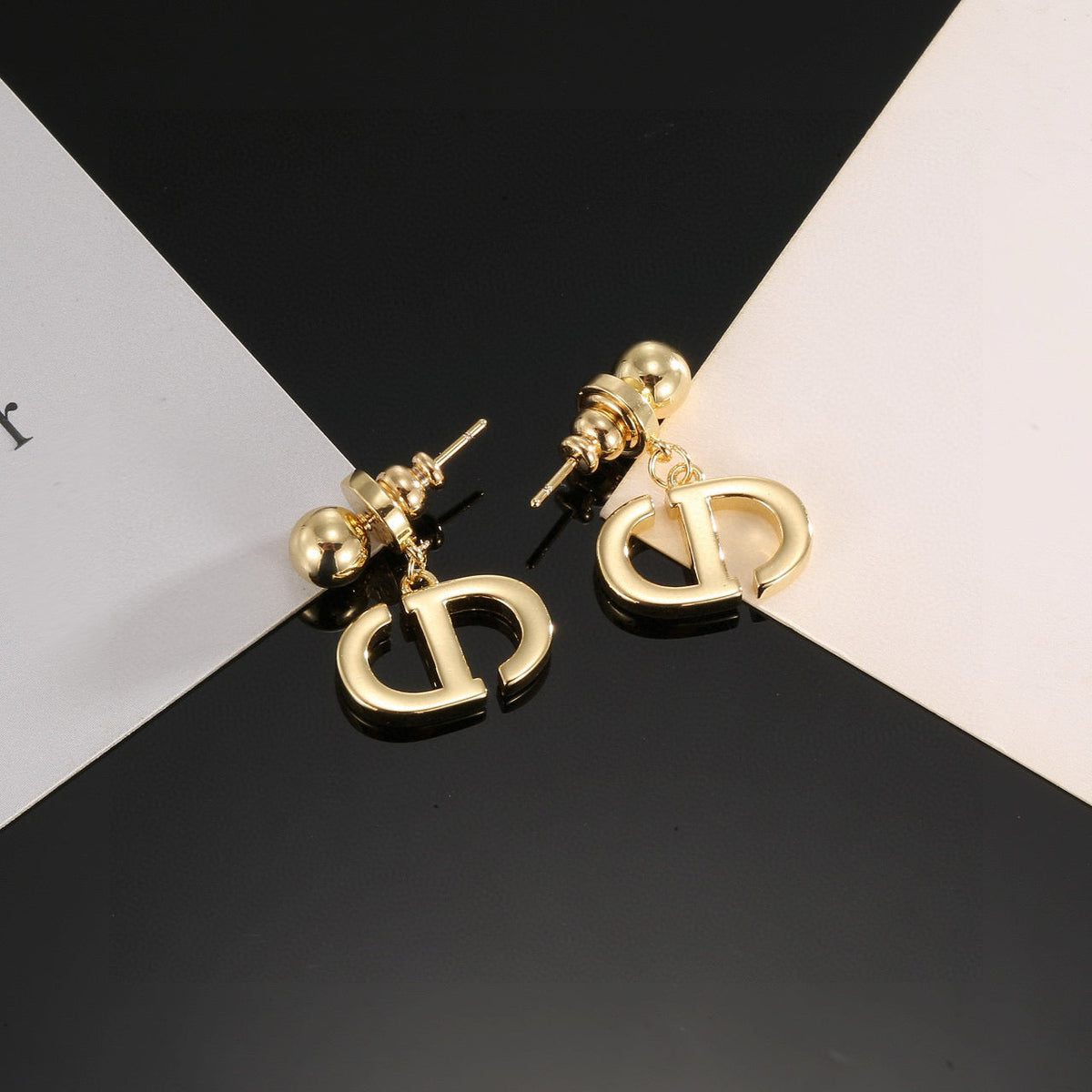 Martin Graham stud earrings in polished metal-tone – main product view