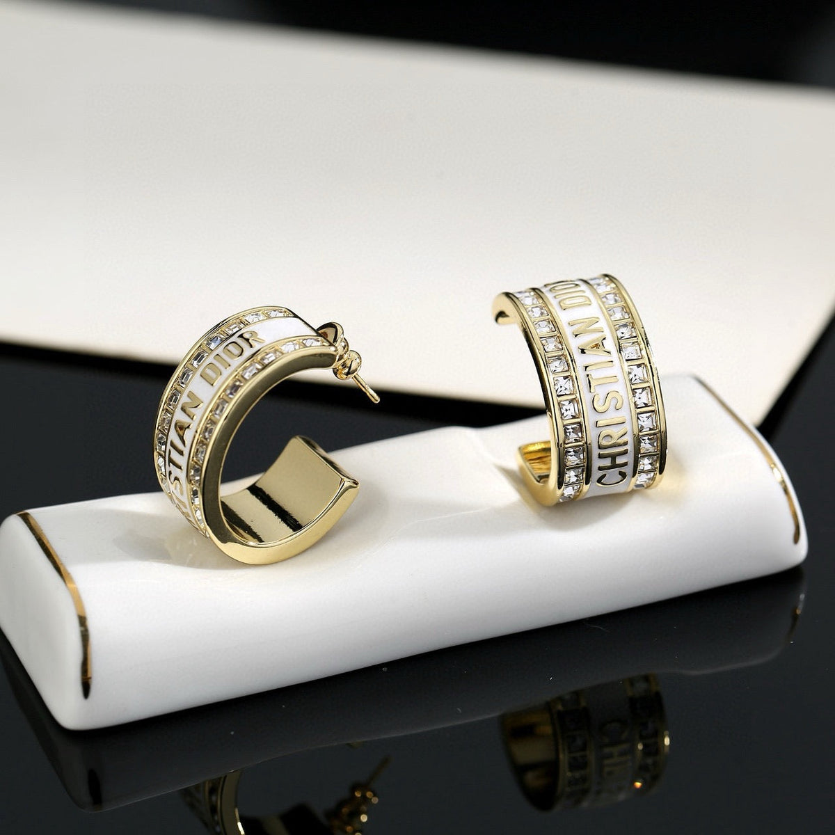 Martin Graham earrings in polished metal-tone – main product view
