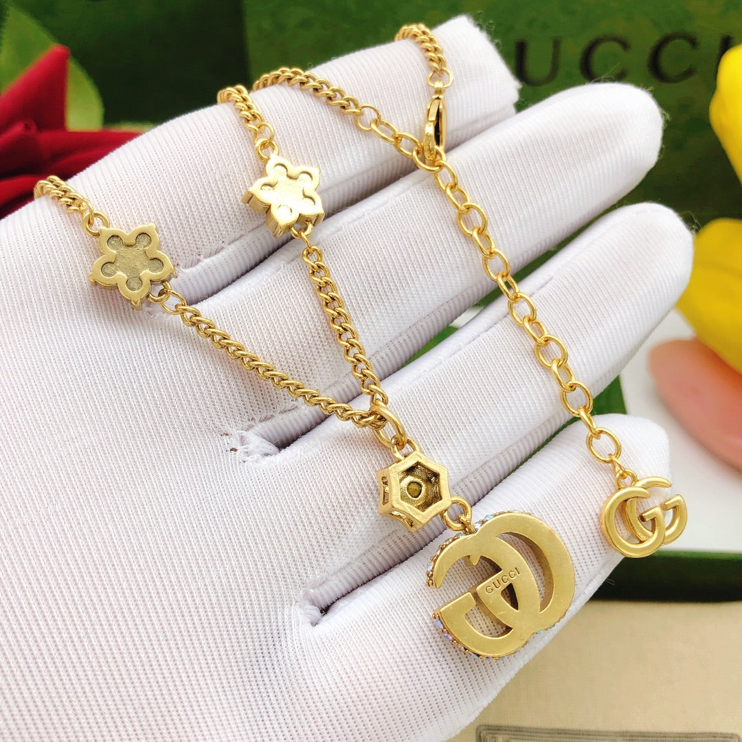 Martin Graham pendant necklace in polished metal-tone – front product view