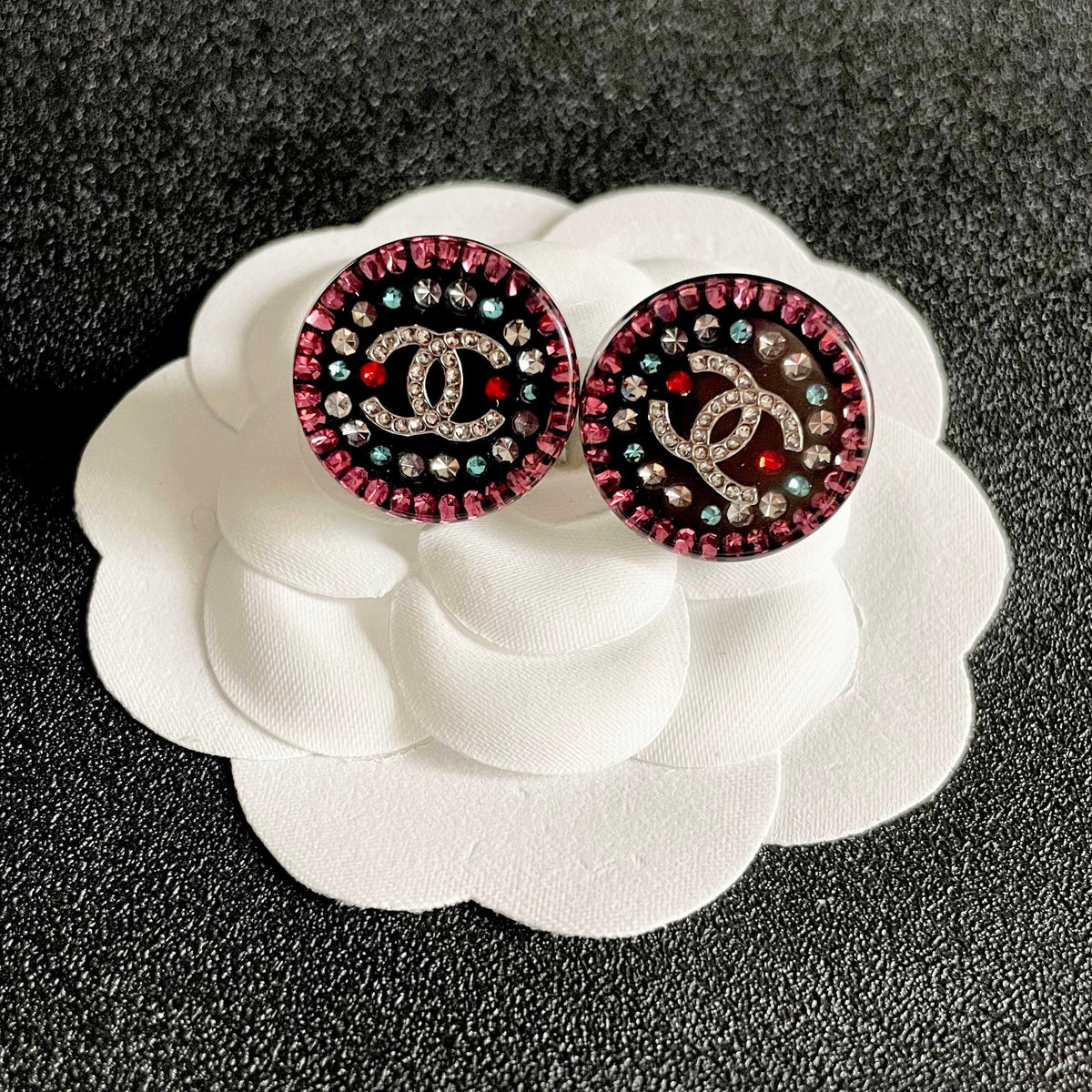 Martin Graham stud earrings in polished metal-tone – front product view