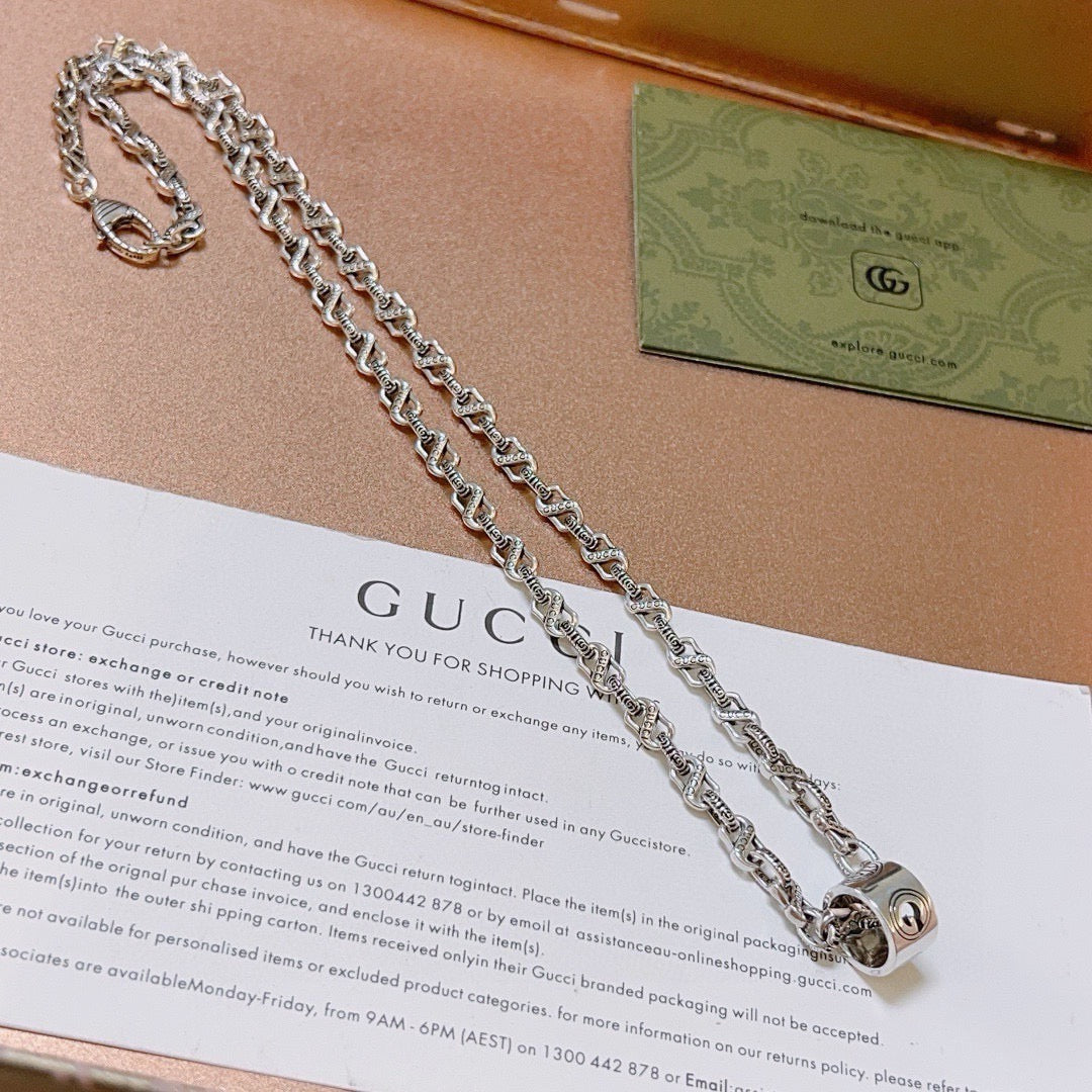 Martin Graham pendant necklace in polished metal-tone – front product view