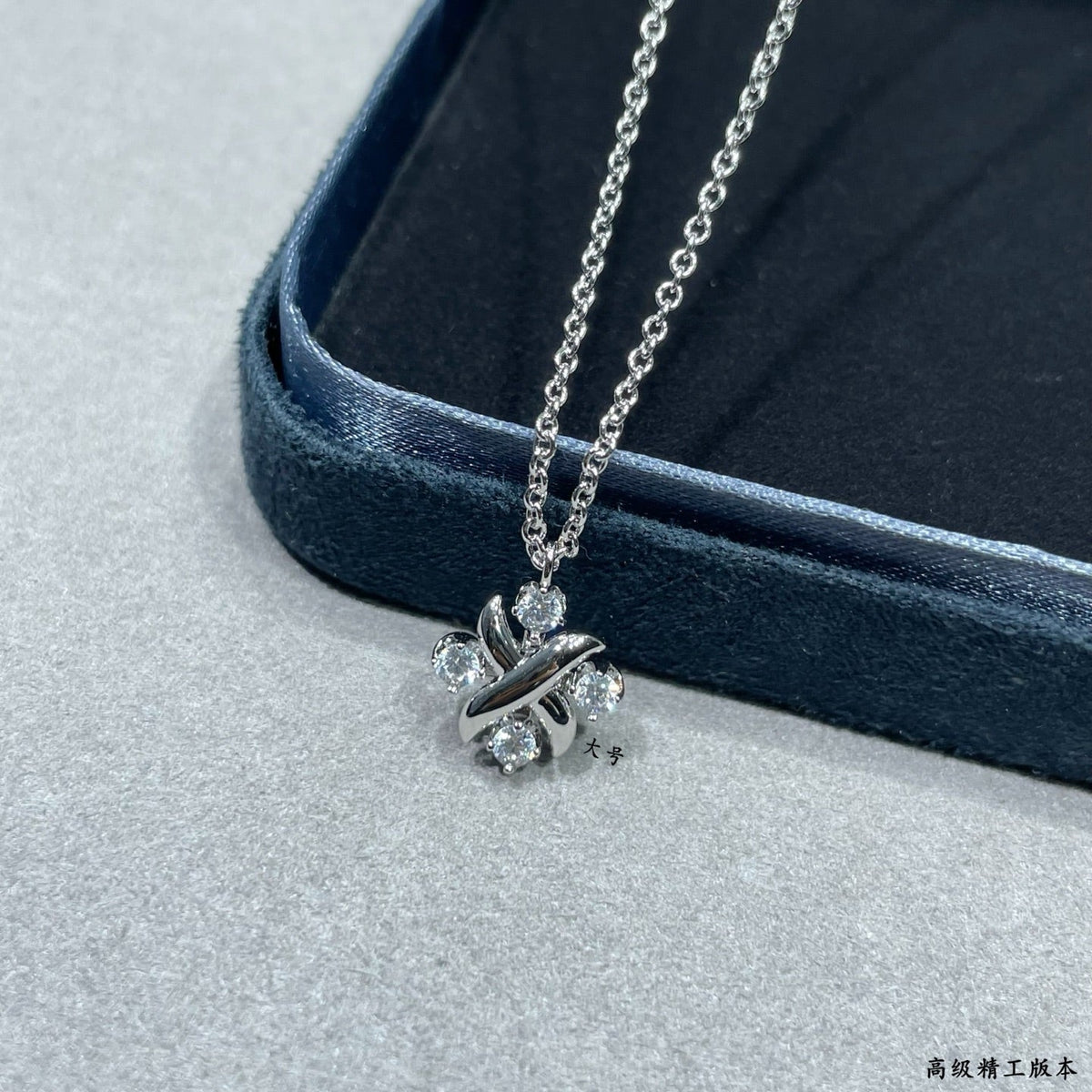 Martin Graham pendant necklace in polished metal-tone – front product view