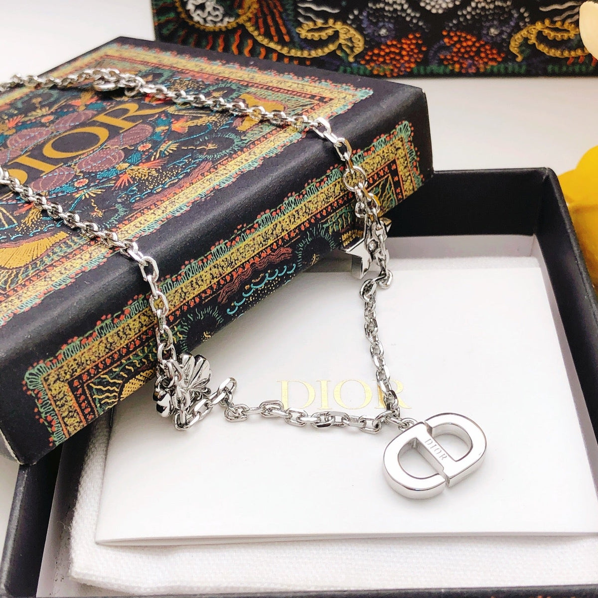 Martin Graham pendant necklace in polished metal-tone – front view