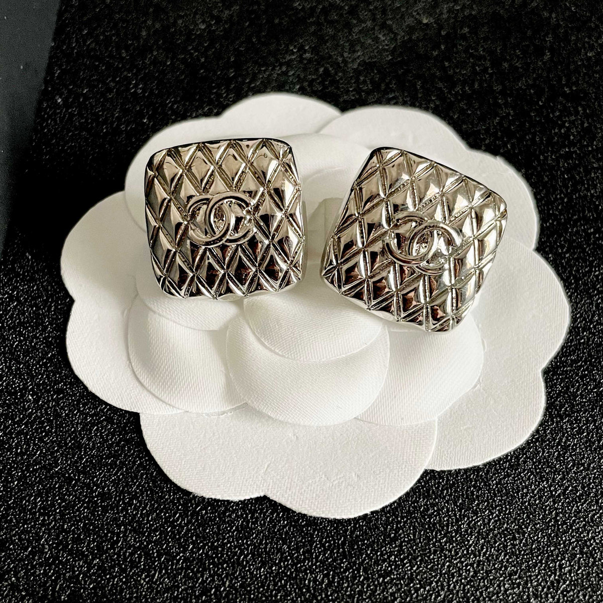 Martin Graham stud earrings in polished metal-tone – front product view