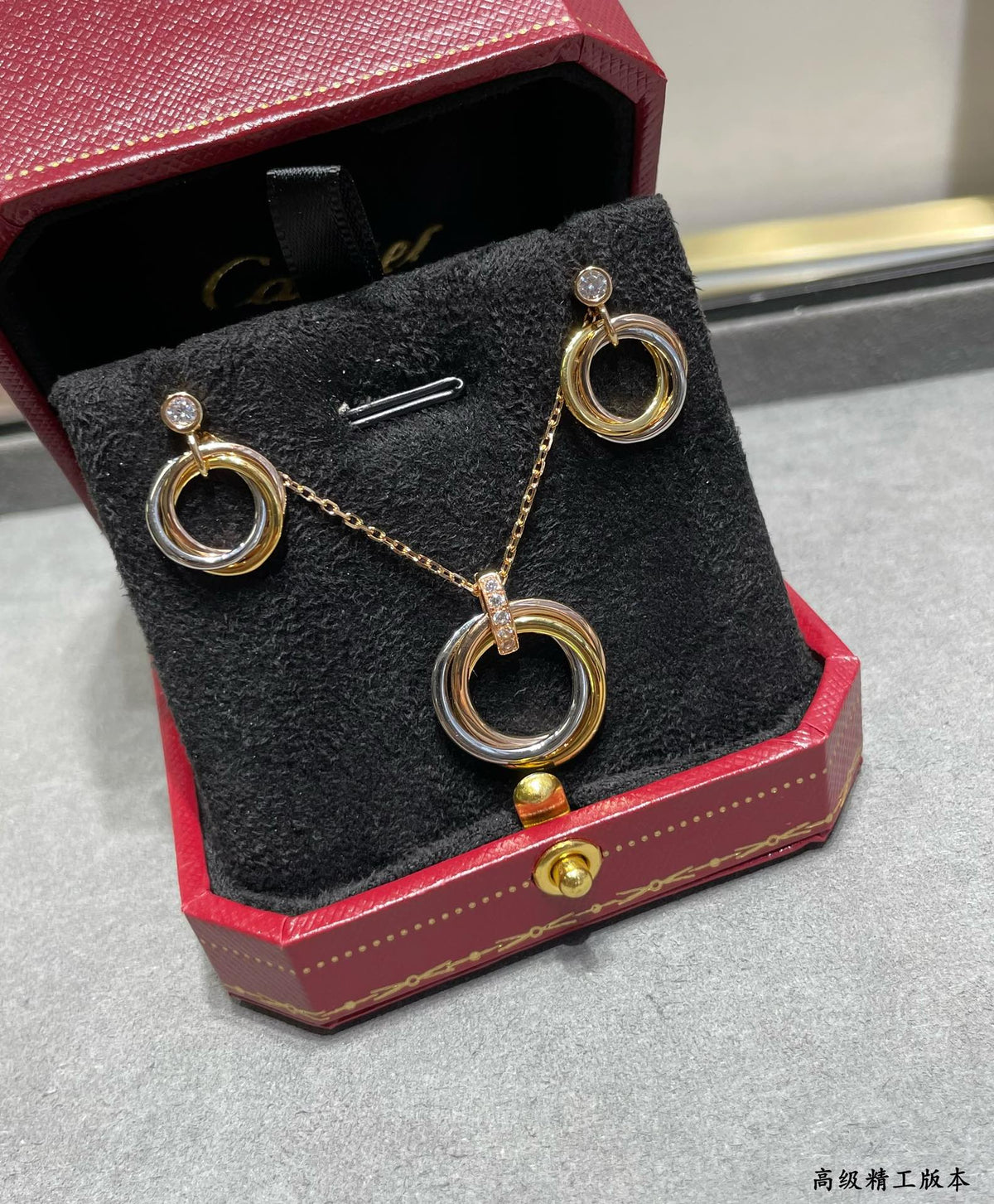 Martin Graham pendant necklace in polished metal-tone – front view