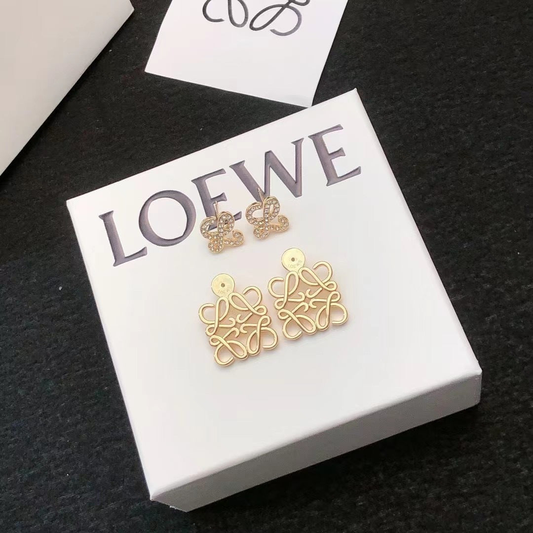 Martin Graham stud earrings in polished metal-tone – front view
