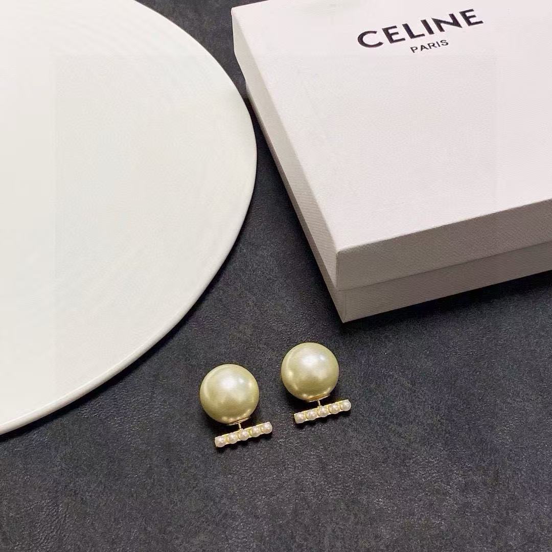 Martin Graham stud earrings in polished metal-tone – front view
