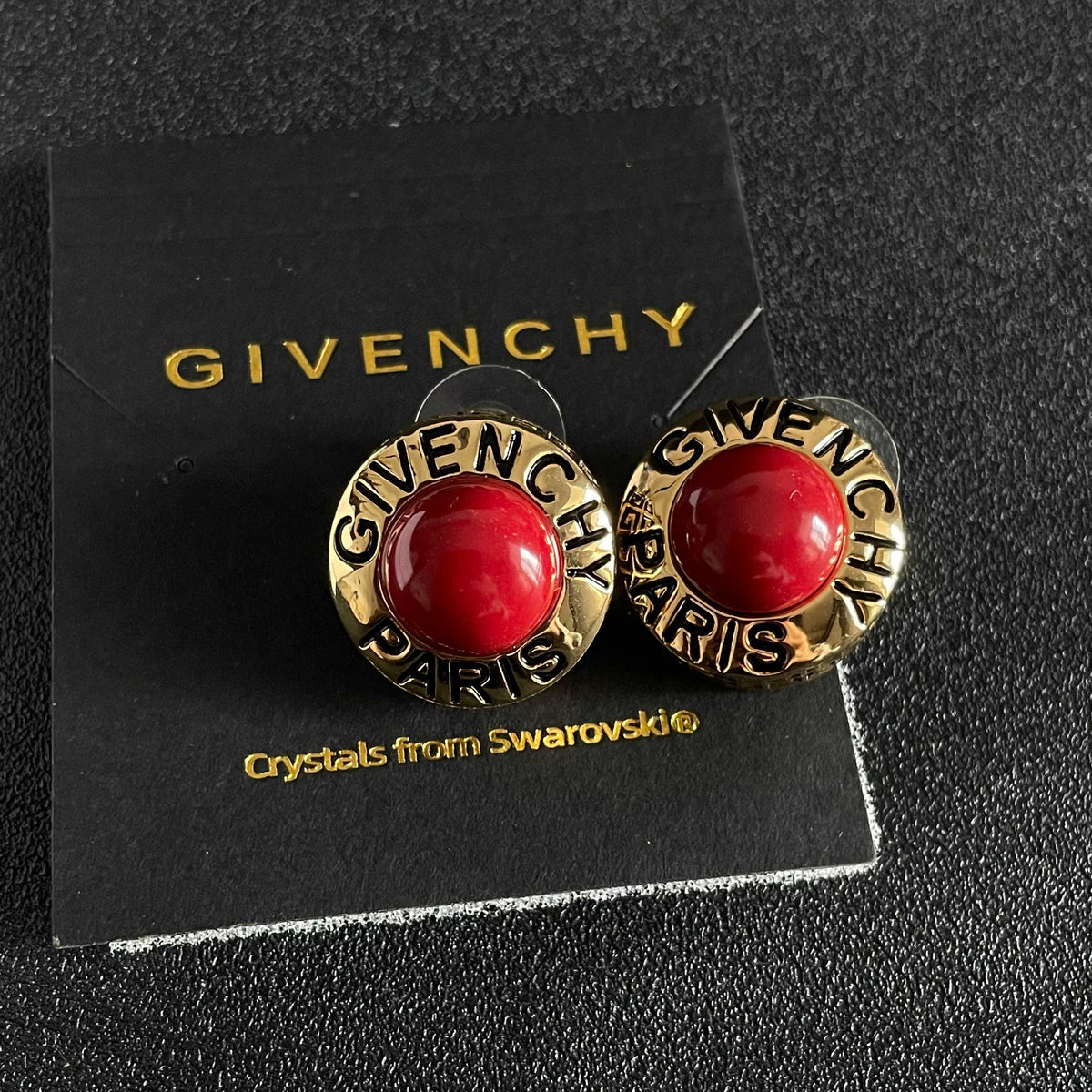 Martin Graham stud earrings in polished metal-tone – front view