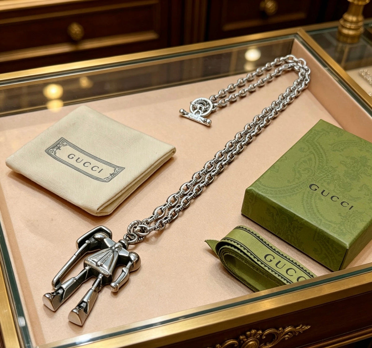 Martin Graham pendant necklace in polished metal-tone – front product view
