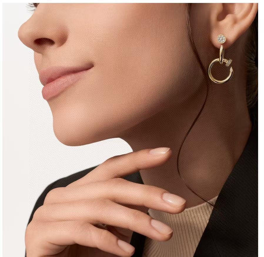 Martin Graham stud earrings in polished metal-tone – front view