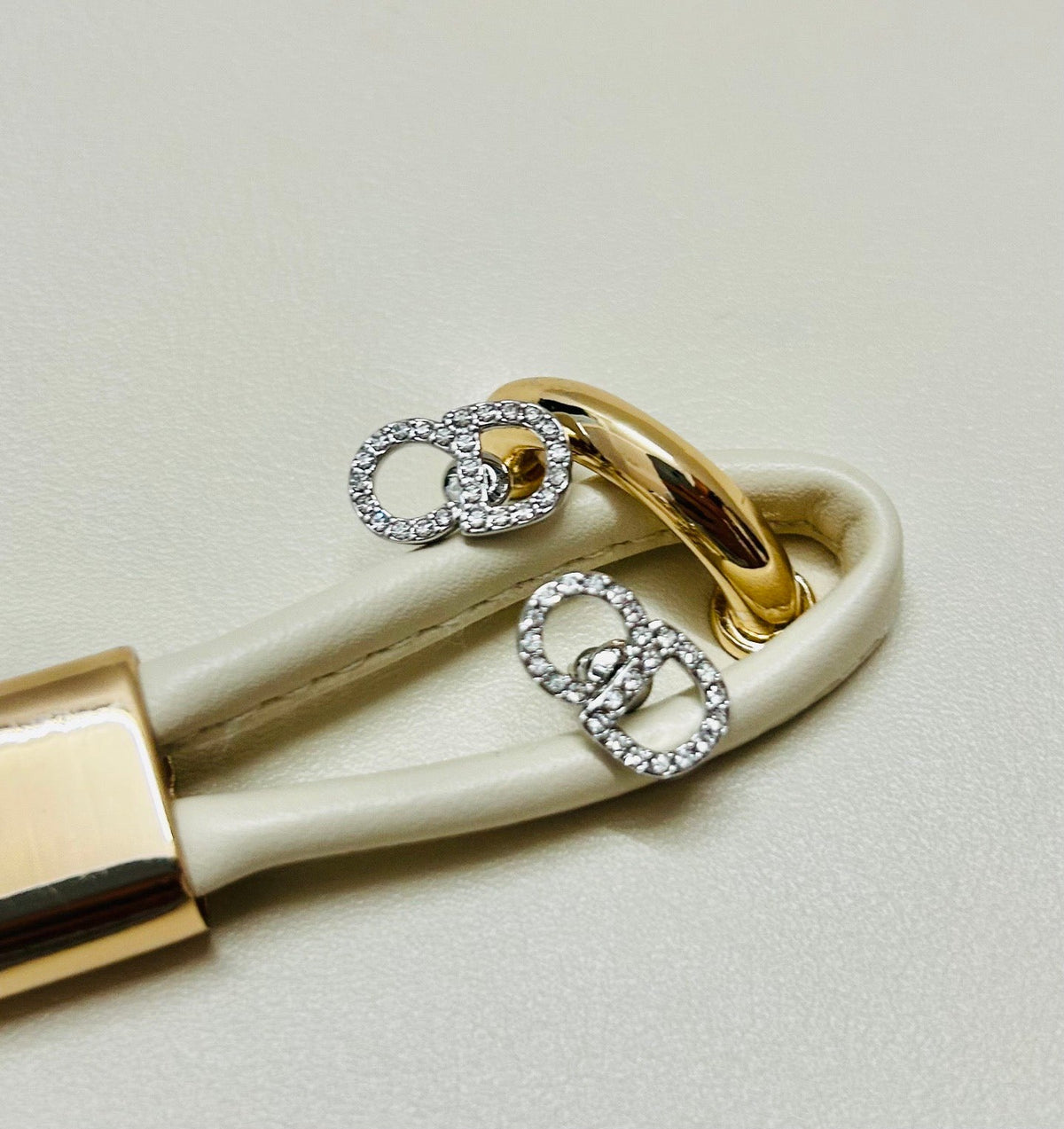 Martin Graham earrings in polished metal-tone – front view