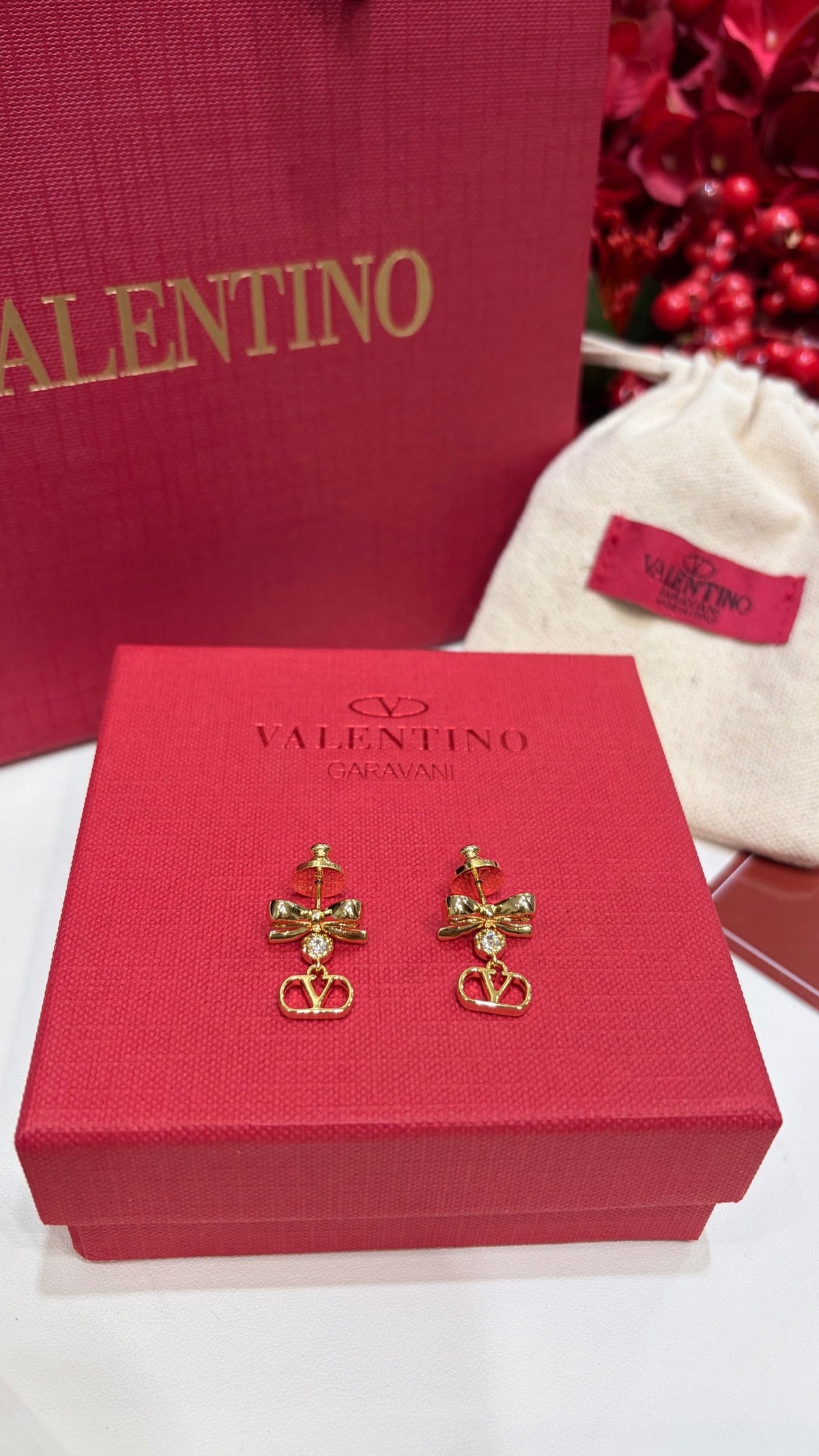 Martin Graham earrings in polished metal-tone – front view