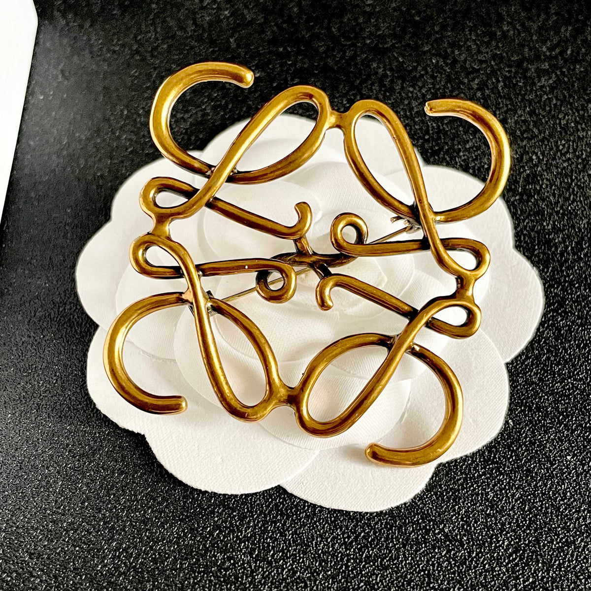 Martin Graham brooch in polished metal-tone – front view