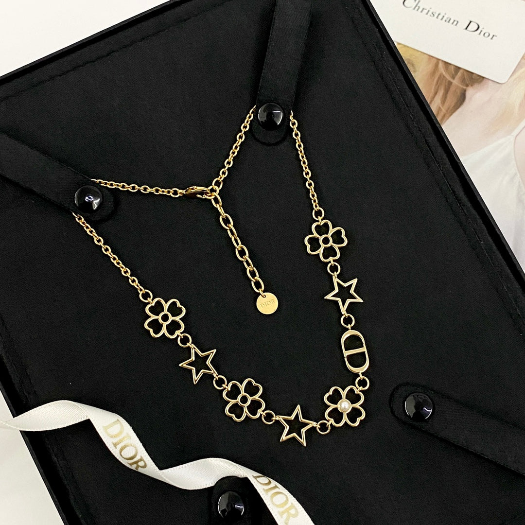 Martin Graham pendant necklace in polished metal-tone – front view