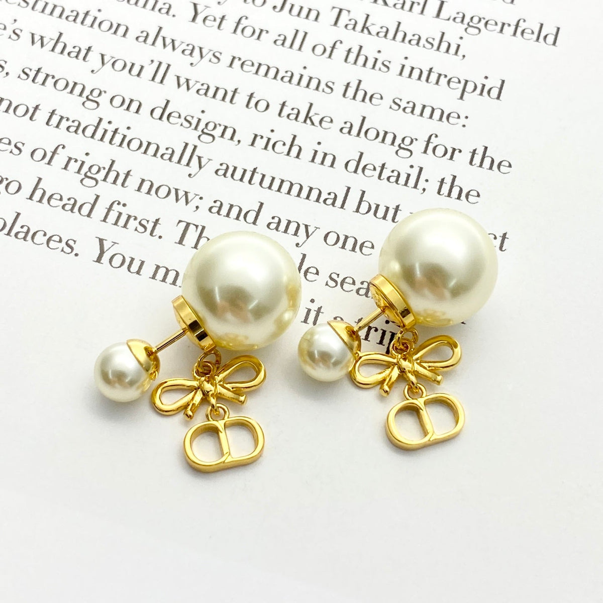 Martin Graham stud earrings in polished metal-tone – front view