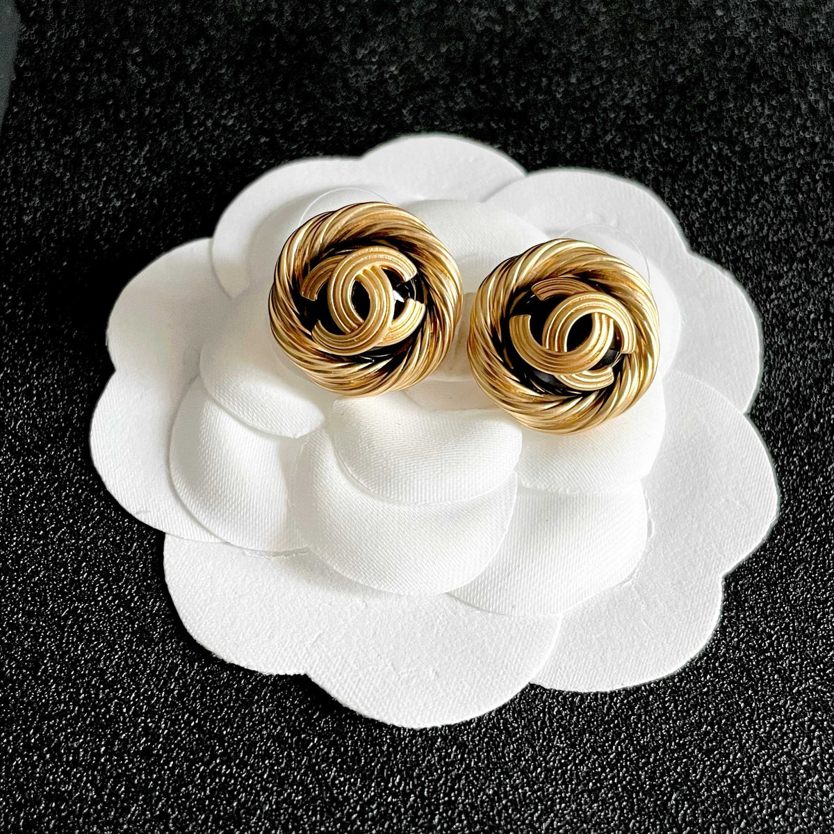 Martin Graham stud earrings in polished metal-tone – front product view