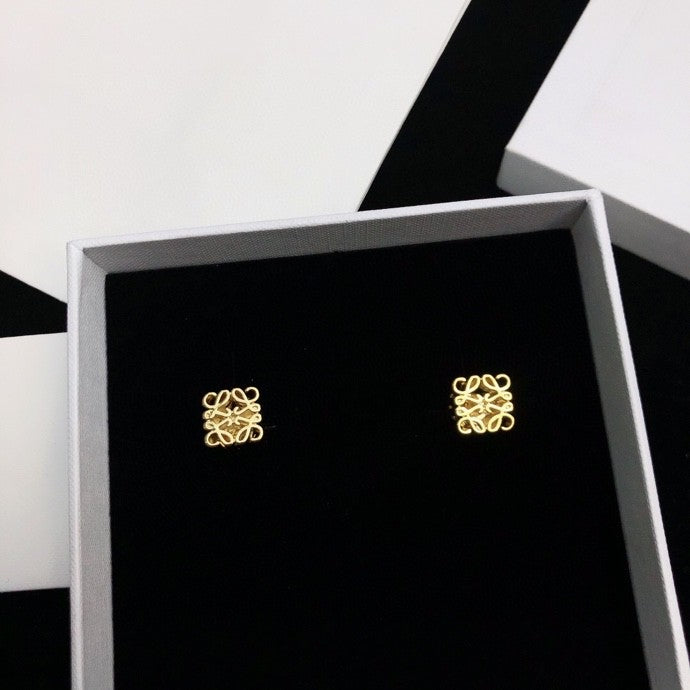 Martin Graham stud earrings in polished metal-tone – front view