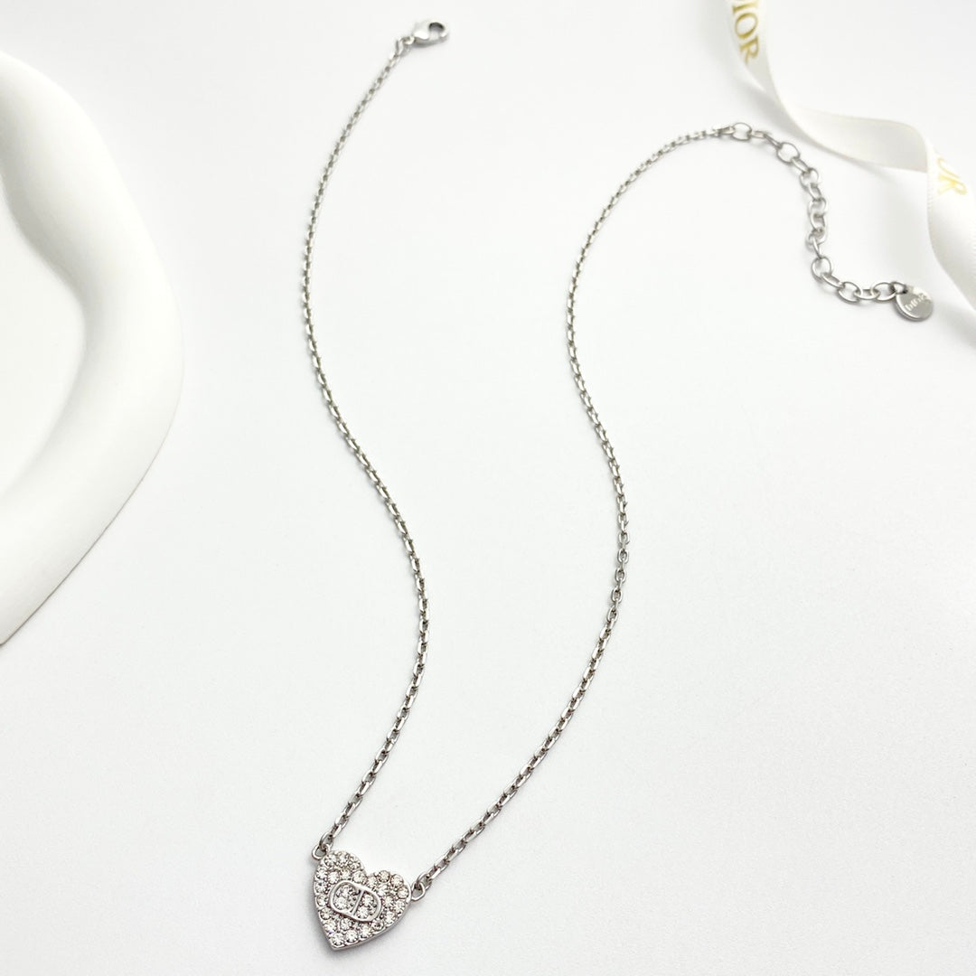Martin Graham pendant necklace in polished metal-tone – front view