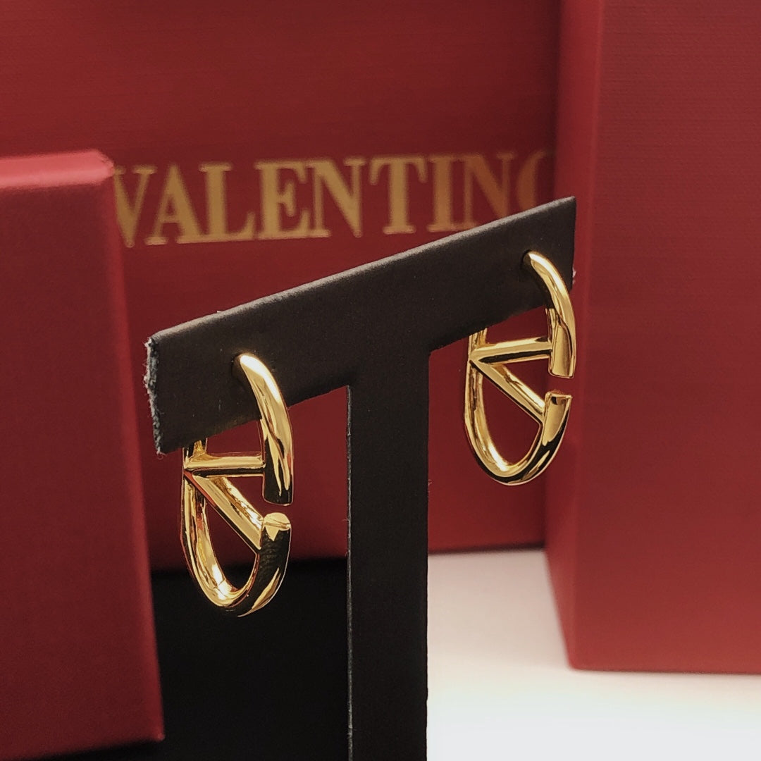 Martin Graham stud earrings in polished metal-tone – front view