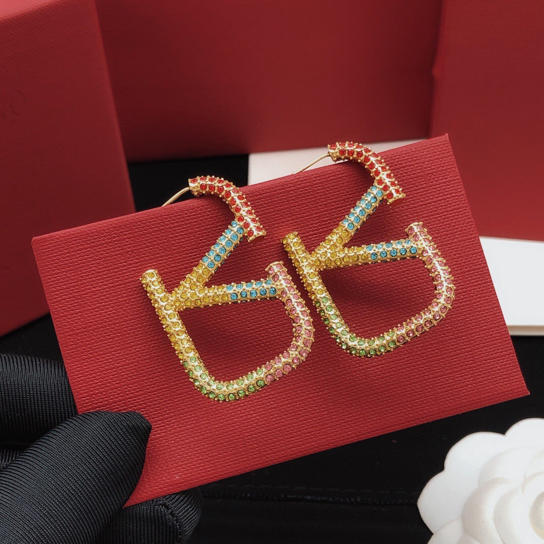 Martin Graham earrings in polished metal-tone – front view