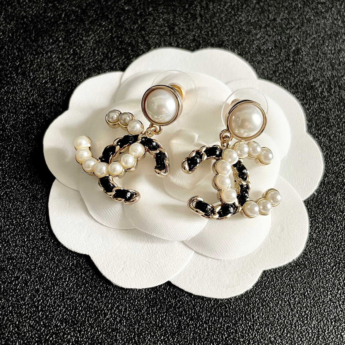 Martin Graham stud earrings in polished metal-tone – front product view