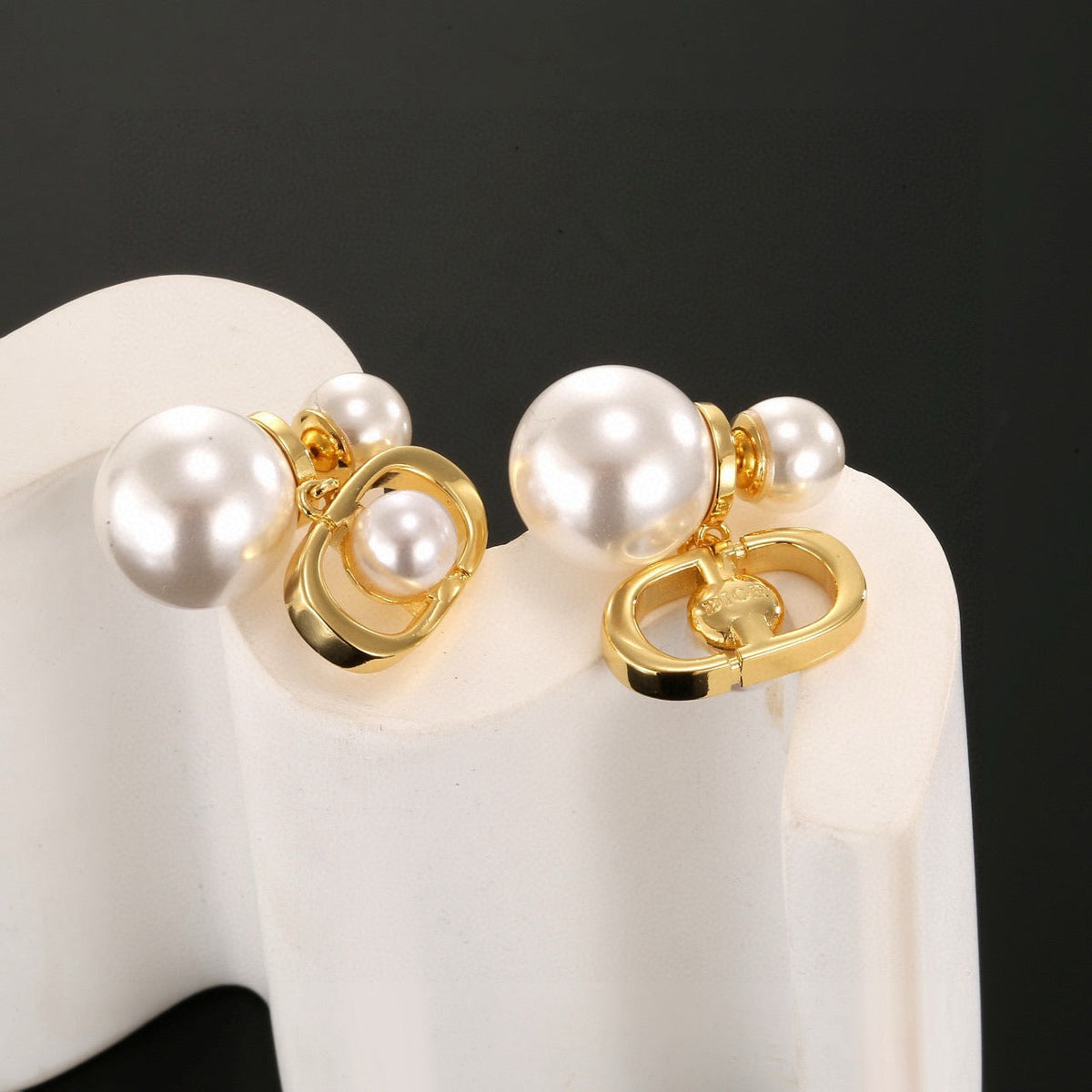 Martin Graham earrings in polished metal-tone – front view