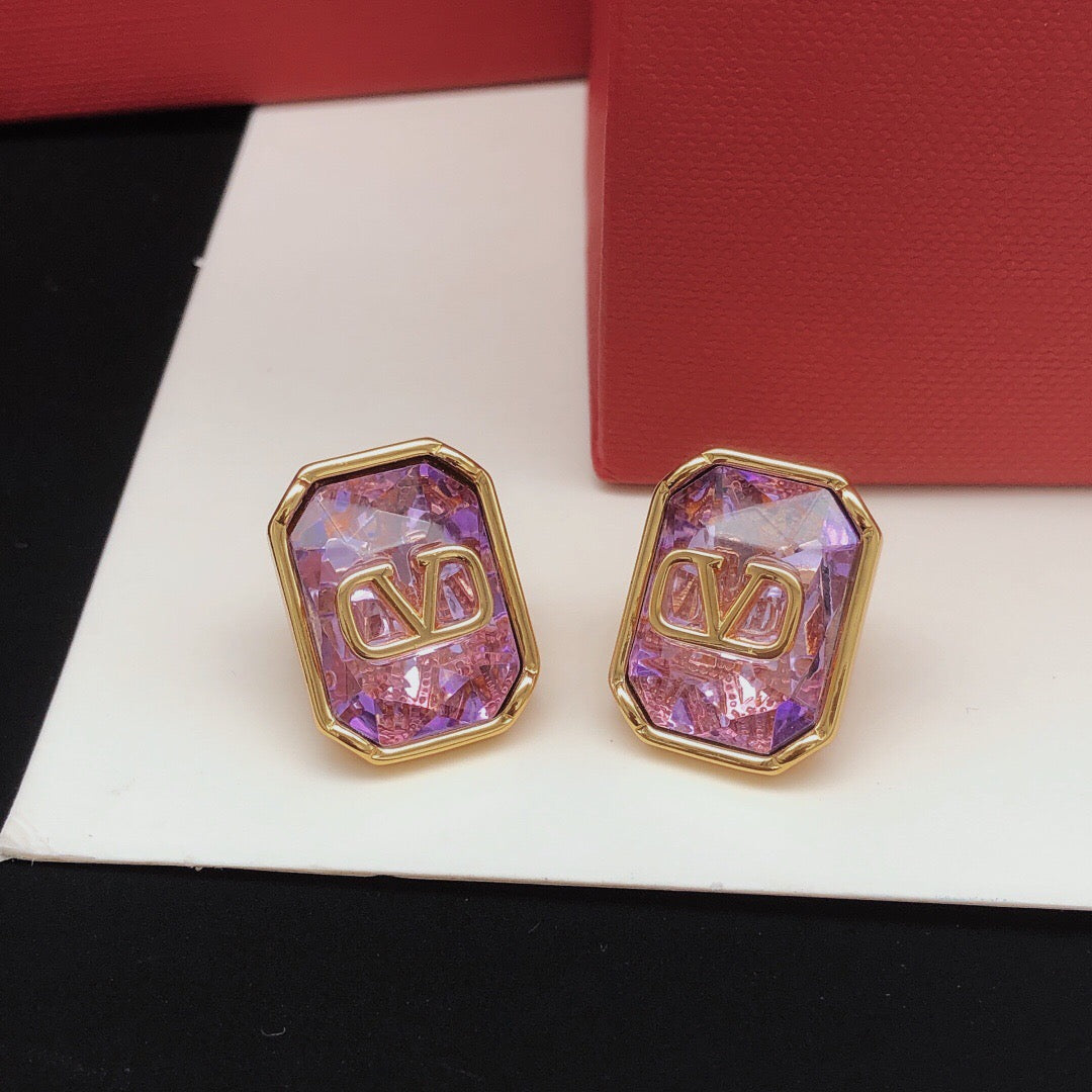 Martin Graham stud earrings in polished metal-tone – front view
