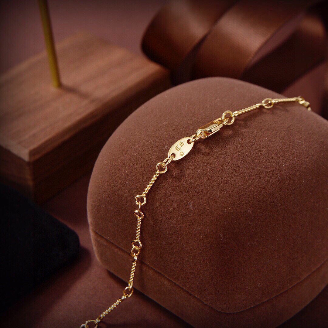 Martin Graham pendant necklace in polished metal-tone – front product view